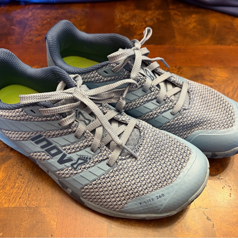 Inov-8 blue cross training shoes.